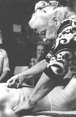 Ida Rolf, Ph.D. working on a client.